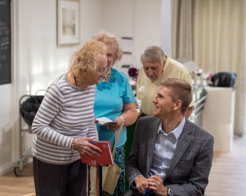 Steve Brown talks to residents at Montgomery Court