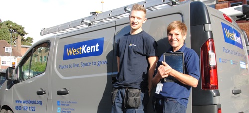 Engineers Troy and Jane in front of West Kent van