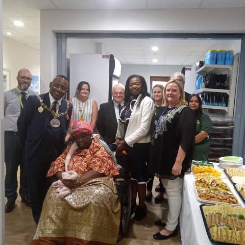 Group opening the shop with the mayor