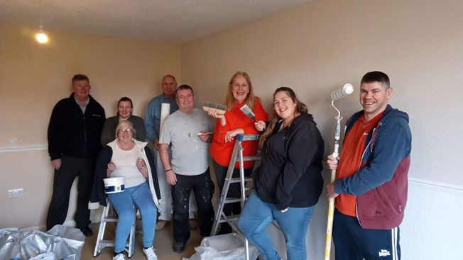 Residents at the painting and decorating workshop