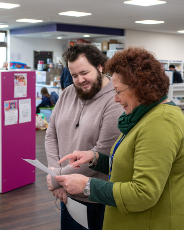 A member of out training and employment team with a resident