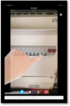 A virtual hand pointing to a fuse box