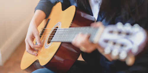 person playing guitar