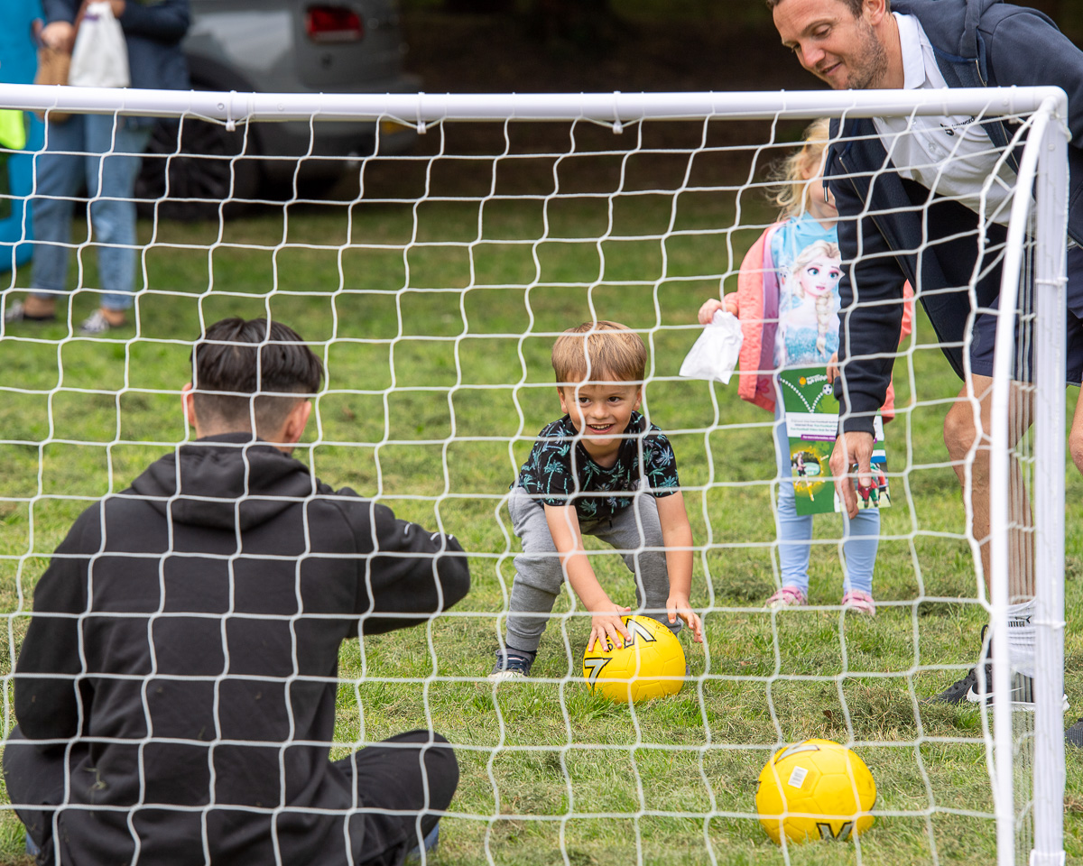 Youth boy playing penalty shootout