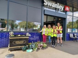 An image of volunteers at outside Swanley station